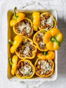 Easy Wild Rice and Sausage Stuffed Peppers with Pesto via forkknifeswoon.com | @forkknifeswoon