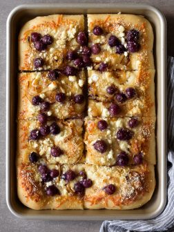 Sheet Pan Pizza with Concord Grapes, Caramelized Onions, and Goat Cheese | via forkknifeswoon.com @forkknifeswoon