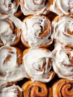 overnight pumpkin cinnamon rolls recipe with maple cream cheese frosting from forkknifeswoon.com