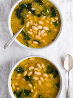 two bowls of white bean soup with kale from forkknifeswoon.com