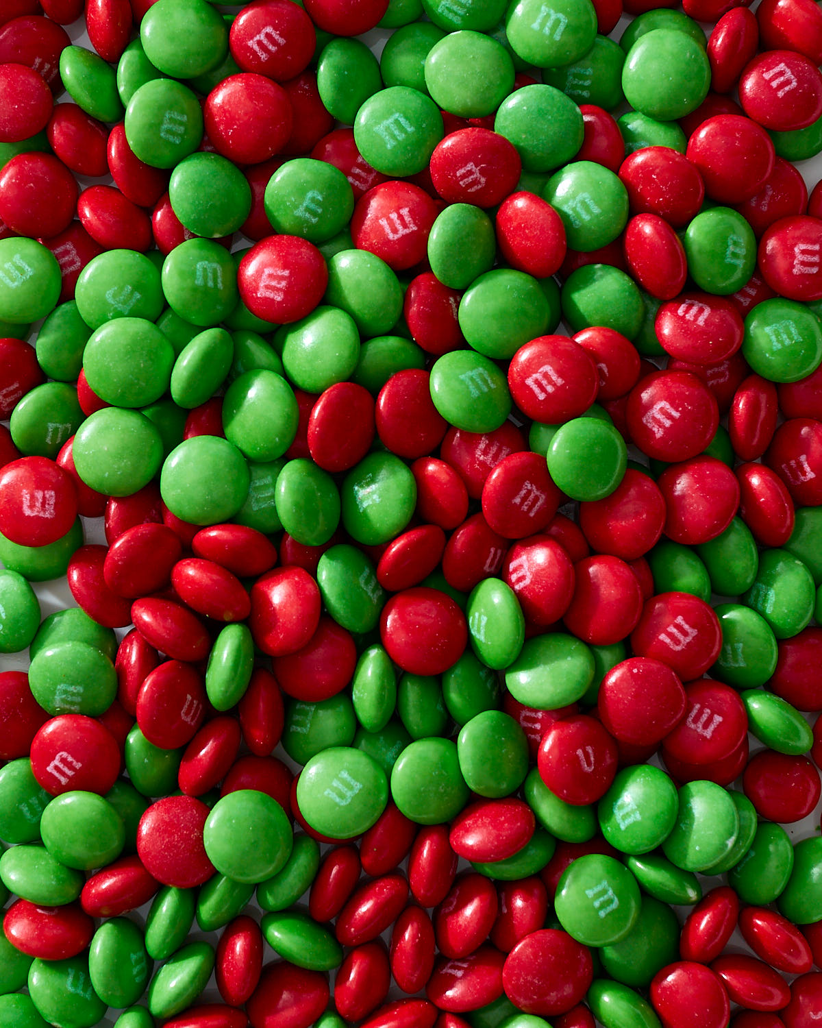 A close up of red and green holiday M&Ms